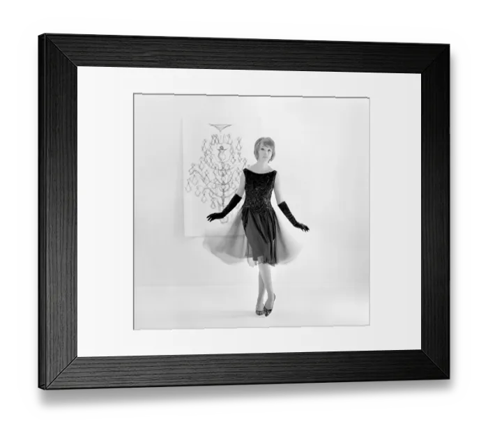 Framed Print : In the 1960s. A fashion model in a typical 1960s dress Framed Print : In the 1960s. A fashion model in a typical 1960s dress