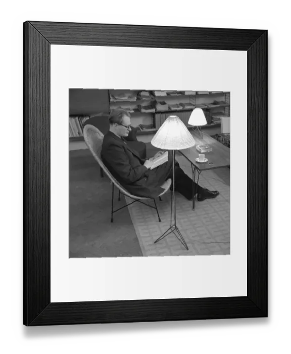 Framed Print : The designers of the Swedish String shelf. Nisse Strinning (1917-2006) pictured at home 1952