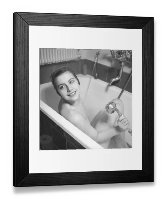Framed Print : 1940s woman in the bathtub. The young ballet girl Rigmor Dall is taking a morning bath
