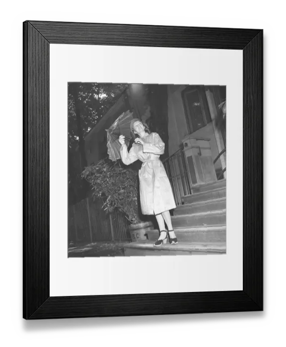 Framed Print : 1940s woman in raincoat Framed Print : 1940s woman in raincoat