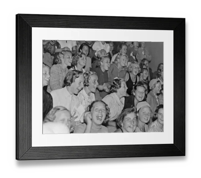 Framed Print : In the 1930s. An audience of young women who is visible exited