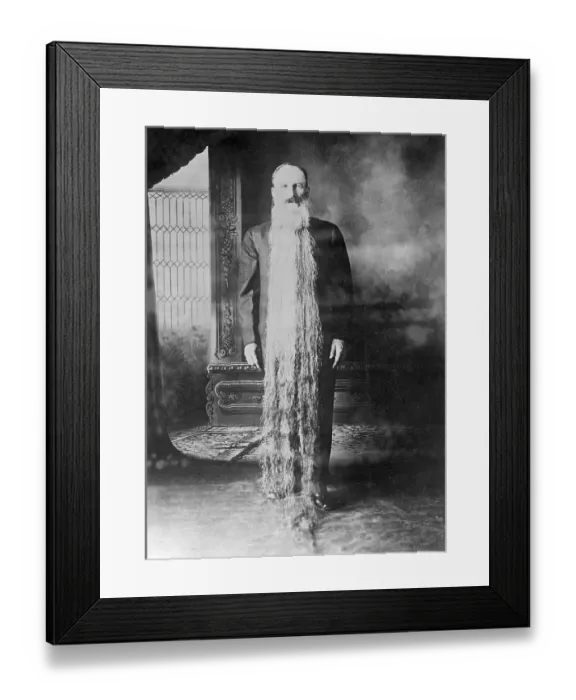 Framed Print : Zacharias T. Wilcox from Carson City Nevada. Famous for having a beard that is more than two meters long. He is pictured standing with the beard hanging from his head down to the floor