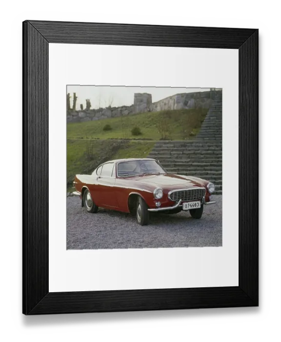 Framed Print : Volvo P1800. A sports car manufactured by Volvo Cars wtih production start 1961 and ending 1973. Styling was by swedish designer Pelle Pettersson. The car was indroduced at the Geneva Motor Show in 1961