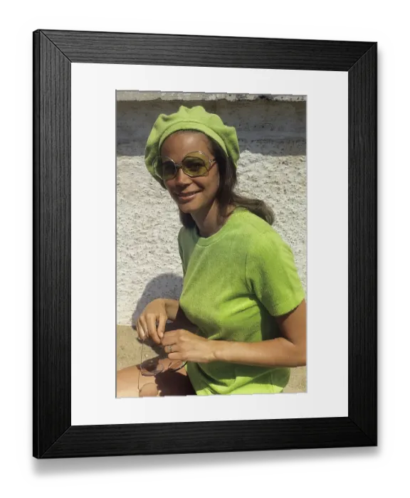 Framed Print : 1960s glasses. Summer of 69. The young female fashion model is wearing 1969 years model of sunglasses and fashion Framed Print : 1960s glasses. Summer of 69. The young female fashion model is wearing 1969 years model of sunglasses and fashion