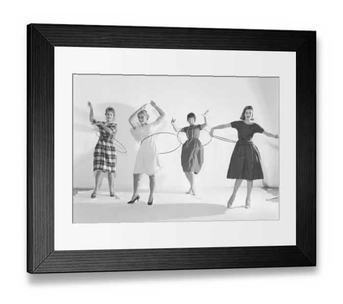 Framed Print : In the 1950s. Women Hula hooping Framed Print : In the 1950s. Women Hula hooping