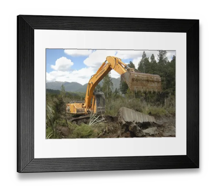 Framed Print : Excavator digging drainage channels in swampy land on the West Coast Framed Print : Excavator digging drainage channels in swampy land on the West Coast