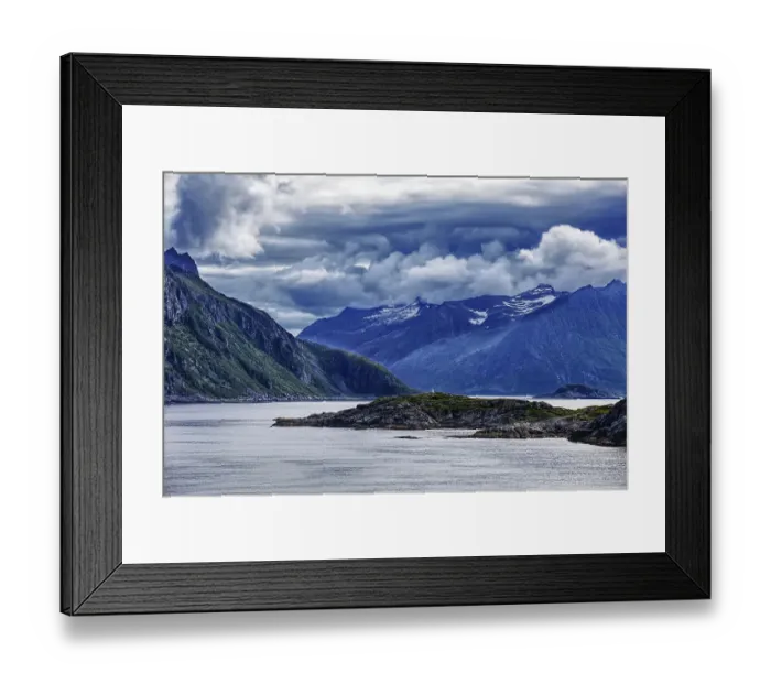 Framed Print : Dramatic fjord landscape with mountains and clouds under a stormy sky, Norway, Europe