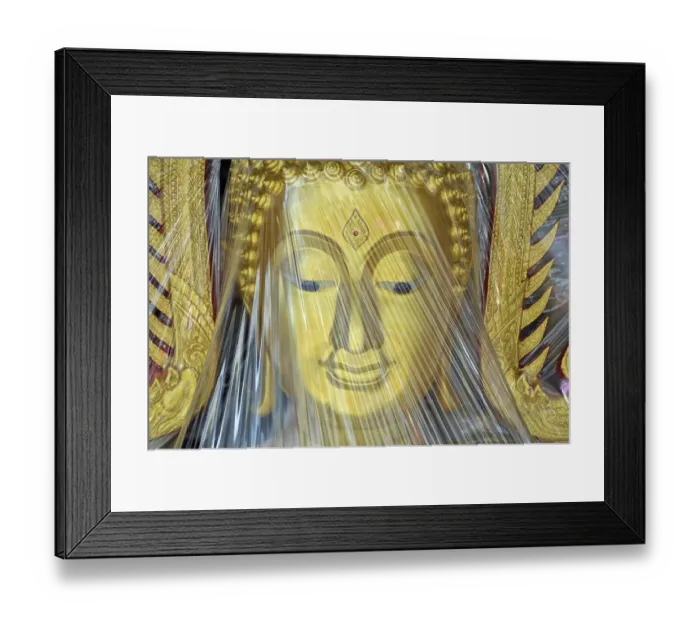 Framed Print : Buddha statue covered with plastic foil Framed Print : Buddha statue covered with plastic foil