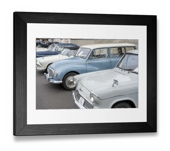 Framed Print : Vintage cars built around 1960 lined up in a car park
