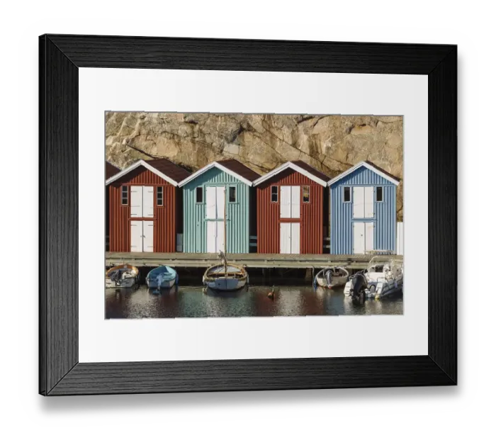 Framed Print : Boats and colourful boathouses in the harbour of Smoegen