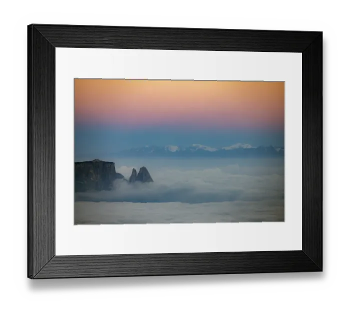 Framed Print : Sea of fog with Dolomite peaks in the background at blue hour