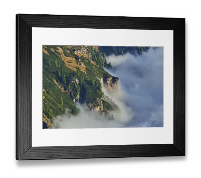 Framed Print : Clouds lying in the valley between Mountains at Hochalpenstrasse Framed Print : Clouds lying in the valley between Mountains at Hochalpenstrasse