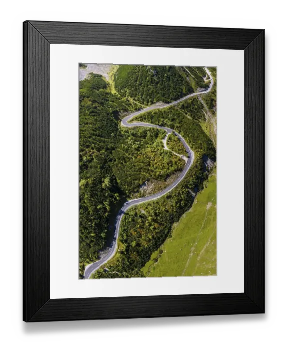Framed Print : Drone shot, winding mountain road Framed Print : Drone shot, winding mountain road