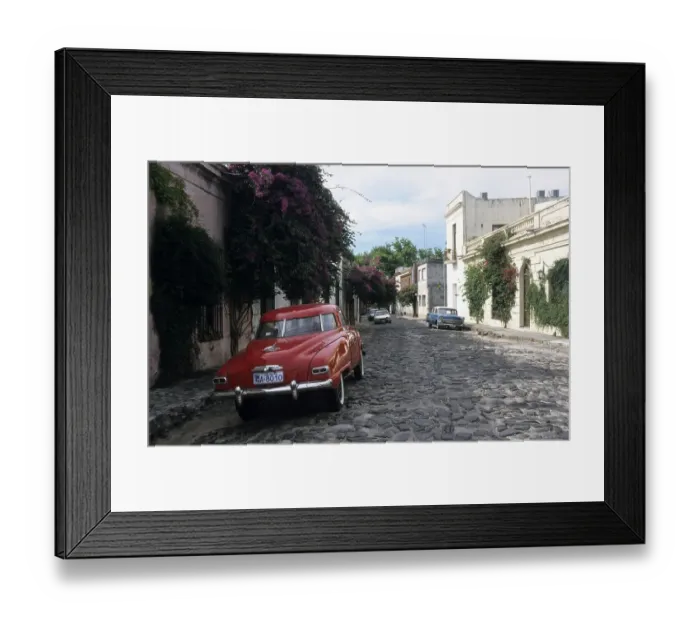 Framed Print : Vintage car on a cobbled road, Colonia del Sacramento