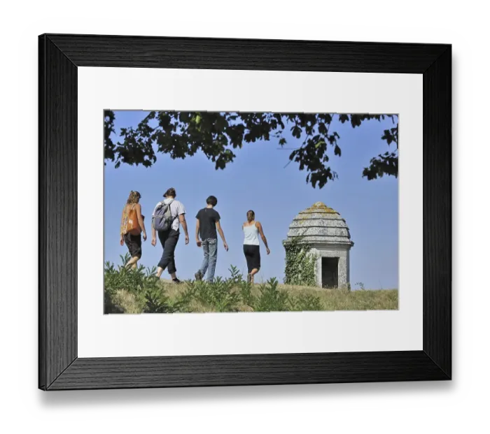 Framed Print : Turret and tourists walking on rampart of the citadel at Brouage