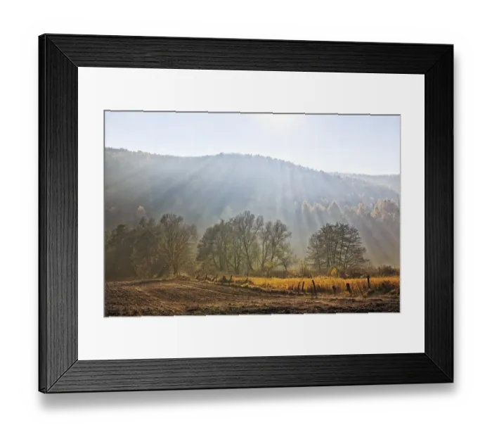 Framed Print : Sunrays shining through haze, autumn landscape