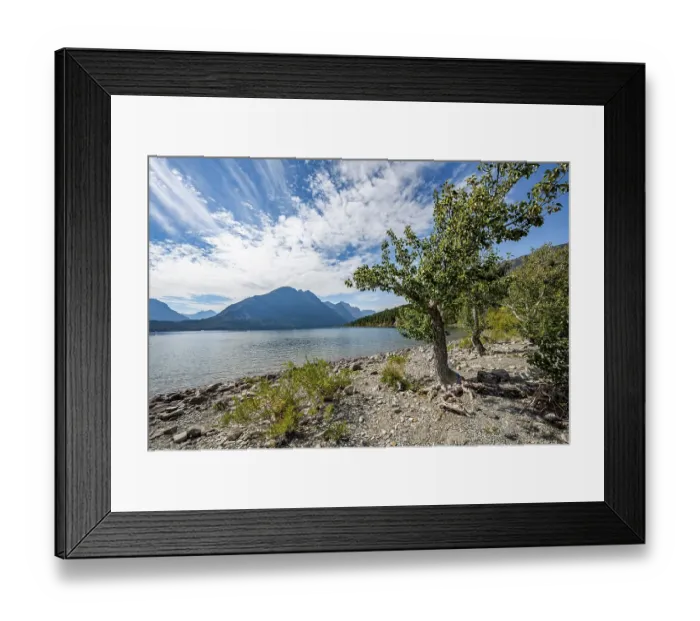 Framed Print : Lake shore of Saint Mary Lake, mountains behind