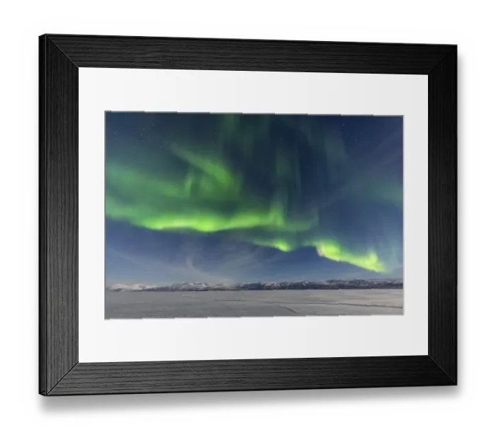 Framed Print : Northern Lights (Aurora Borealis) over snowy mountains Framed Print : Northern Lights (Aurora Borealis) over snowy mountains