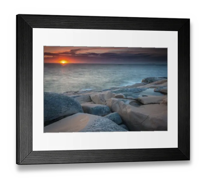 Framed Print : Rocks, sunset, evening atmosphere at the coastline near Smoegen
