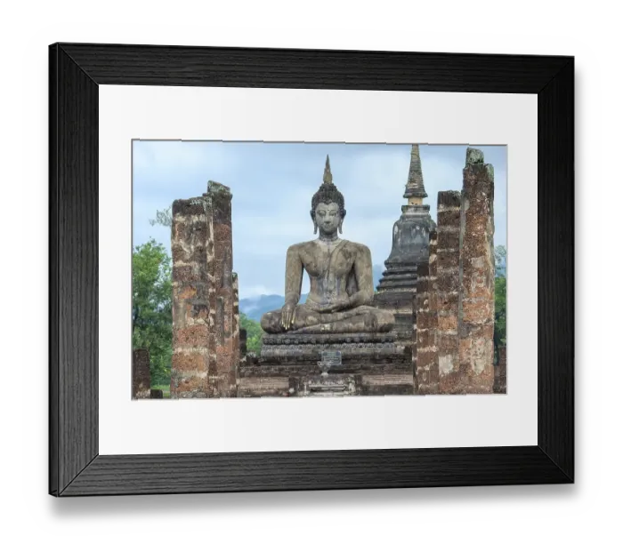 Framed Print : Buddha statue at the ruins of Wat Phra Si Rattana Mahathat temple complex Framed Print : Buddha statue at the ruins of Wat Phra Si Rattana Mahathat temple complex