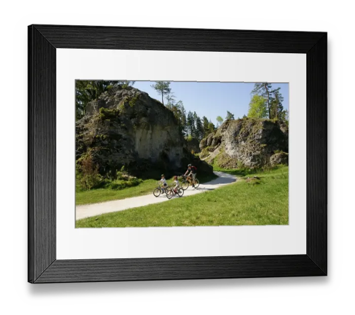 Framed Print : Cyclists between the rocks in the Wental valley near Steinheim am Albuch Framed Print : Cyclists between the rocks in the Wental valley near Steinheim am Albuch