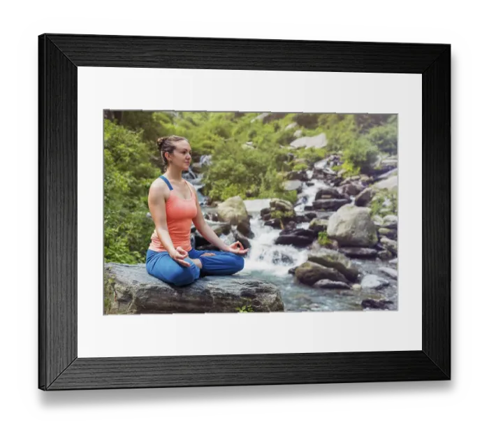 Framed Print : Woman in Hatha yoga asana Padmasana outdoors at tropical waterfall Framed Print : Woman in Hatha yoga asana Padmasana outdoors at tropical waterfall