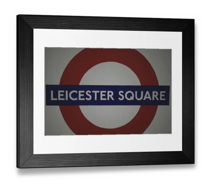Framed Print : Leicester Square tube sign and underground station