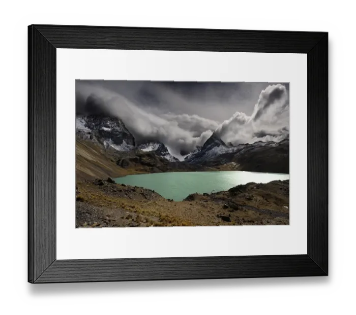 Framed Print : Lagoon with the Andes Mountains and dramatic clouds