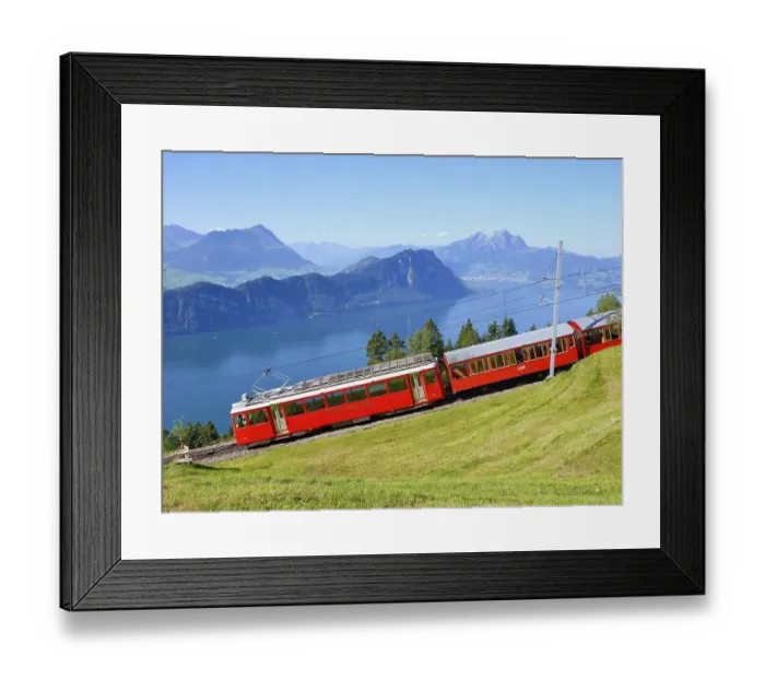 Framed Print : Cogwheel railway up the Rigi, behind Lake Lucerne with Buergenstock