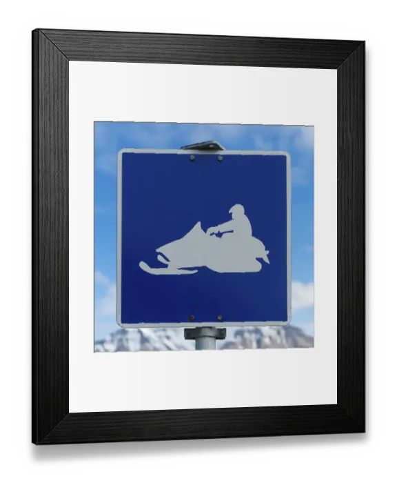 Framed Print : Snow mobile warning road signpost