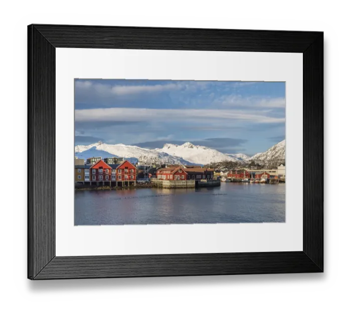 Framed Print : Townscape Svolvaer, harbour, snow-covered mountains in the background