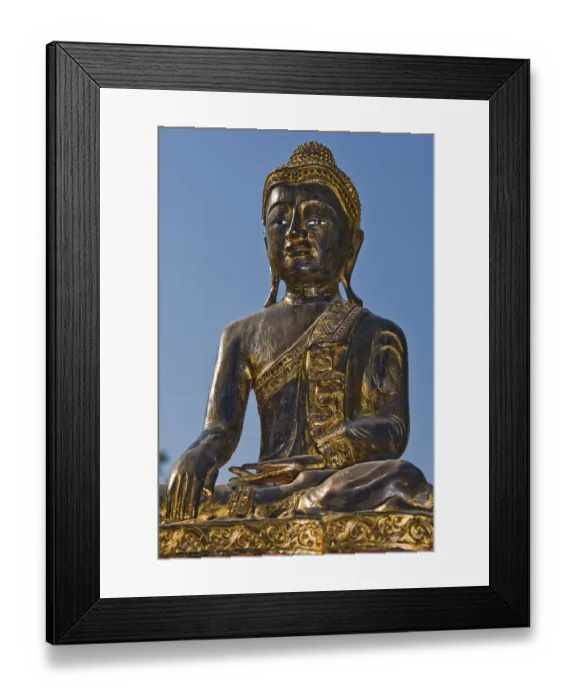 Framed Print : Wooden statue of a Buddha Framed Print : Wooden statue of a Buddha