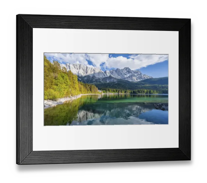 Framed Print : Zugspitze massif and Zugspitze reflected in Eibsee lake
