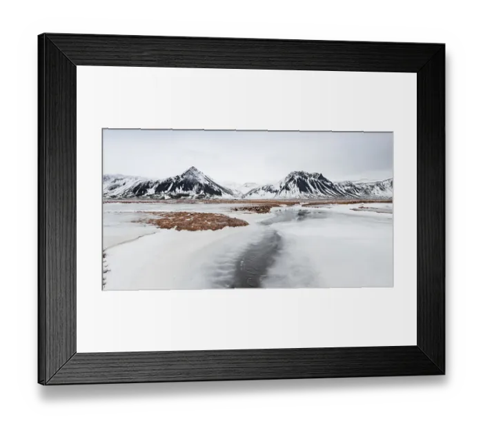 Framed Print : Icy landscape, volcanic black mountains with snow