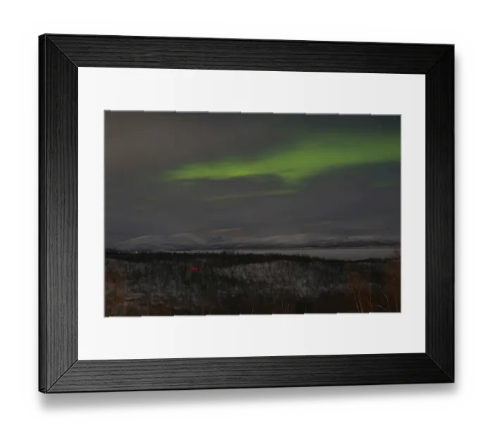 Framed Print : Aurora borealis over snow-covered mountains and birch trees Framed Print : Aurora borealis over snow-covered mountains and birch trees