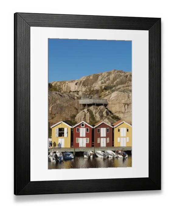 Framed Print : Boats and colourful boathouses in the harbour of Smoegen