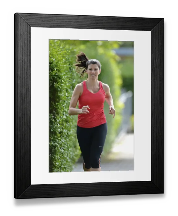Framed Print : Young woman jogging, Stuttgart