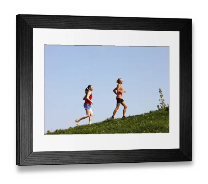 Framed Print : Two recreational runners, young women