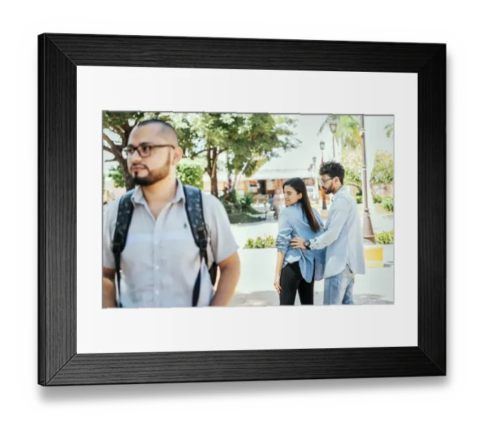 Framed Print : Unfaithful girlfriend looking at another man on the street