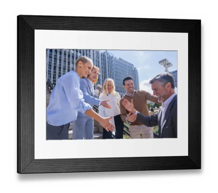 Framed Print : Greeting each other coworker. Group of executives or business people outdoors in a corporate office area