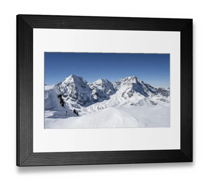 Framed Print : Mountain panorama with snow-covered mountain landscape in winter