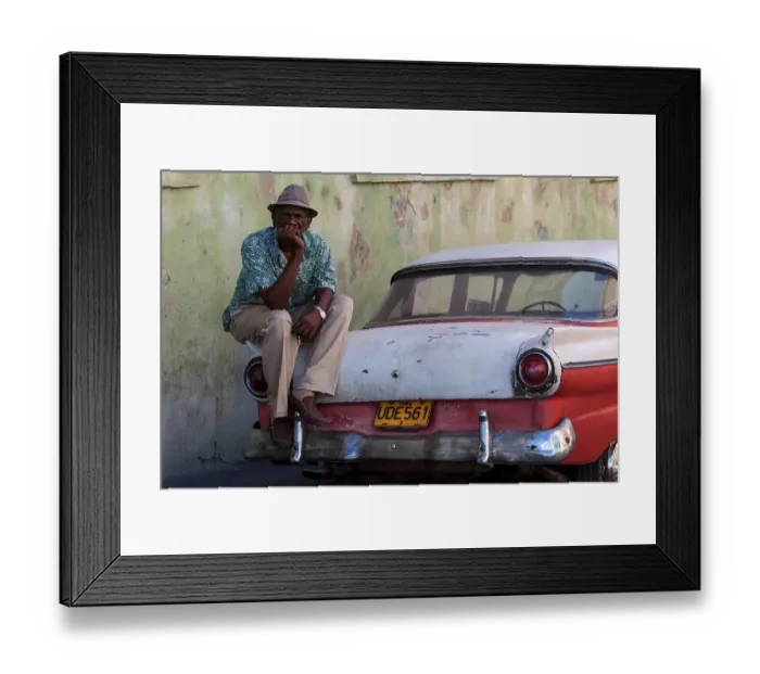 Framed Print : Cuban taxi driver with his vintage taxi