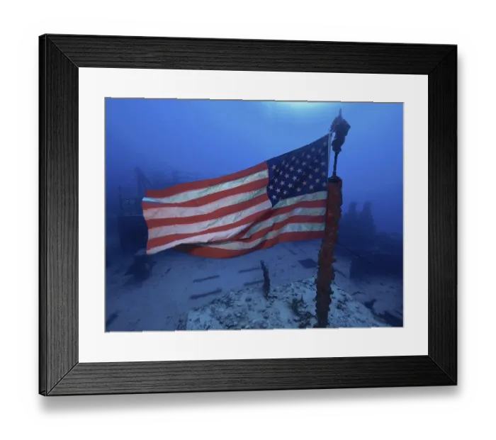Framed Print : US flag waving in the current on the wreck of the USS Spiegel Grove Framed Print : US flag waving in the current on the wreck of the USS Spiegel Grove
