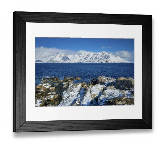 Framed Print : Lofoten islands and Norwegian sea in winter with snow covered mountains Framed Print : Lofoten islands and Norwegian sea in winter with snow covered mountains