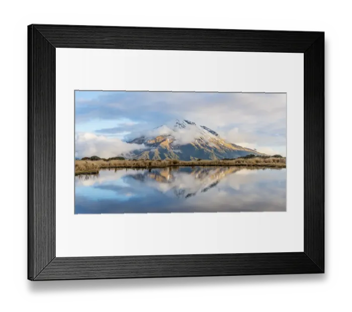 Framed Print : Reflection in Pouakai Tarn, stratovolcano Mount Taranaki or Mount Egmont with cloud Framed Print : Reflection in Pouakai Tarn, stratovolcano Mount Taranaki or Mount Egmont with cloud