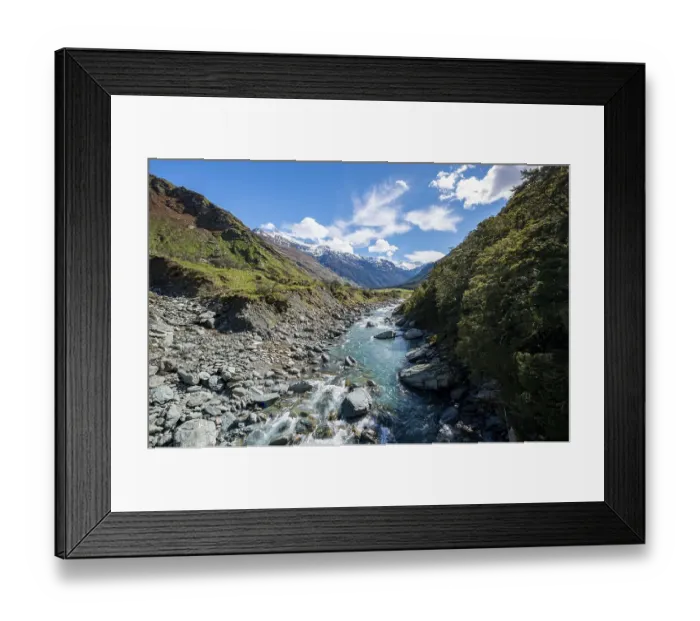 Framed Print : Rob Roy Stream and snow covered mountains