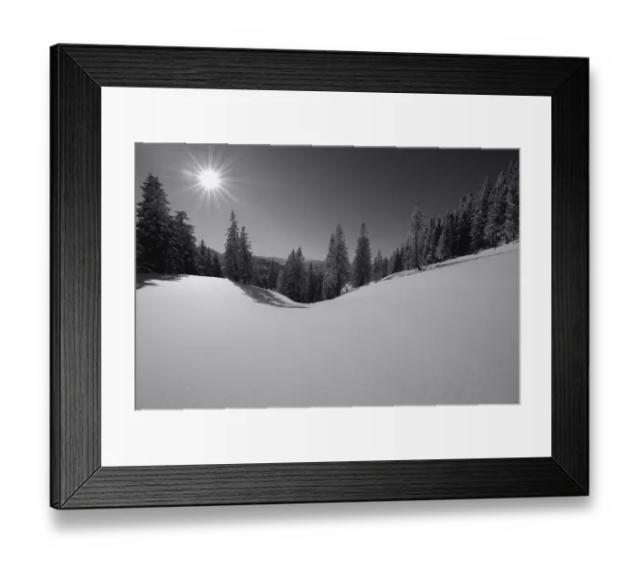 Framed Print : Winter forest with mountain range in backlight