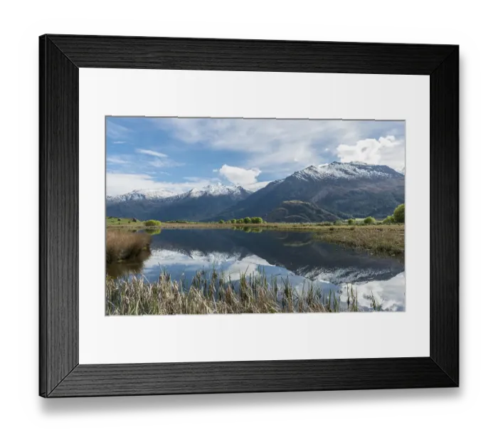 Framed Print : Mountain range reflected in a lake