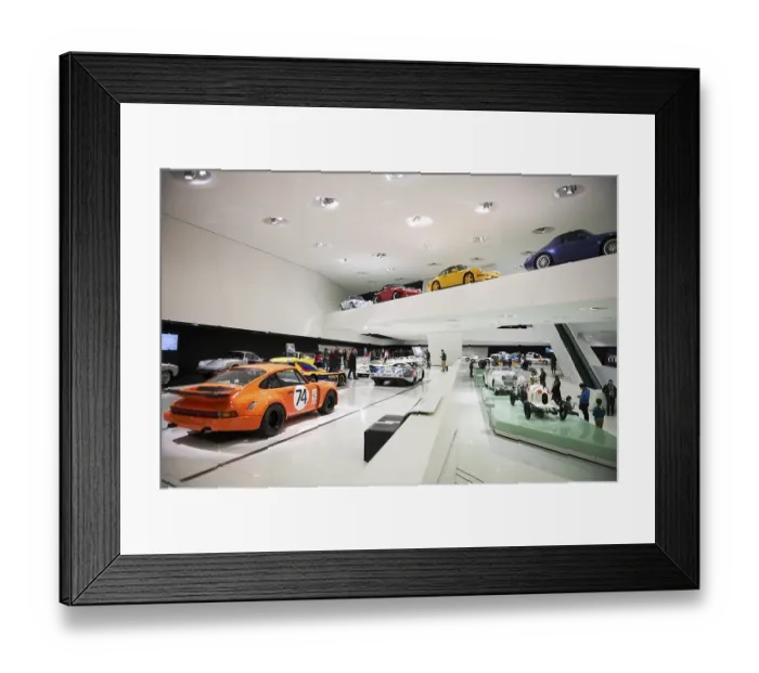 Framed Print : Exhibition room with various Porsche cars