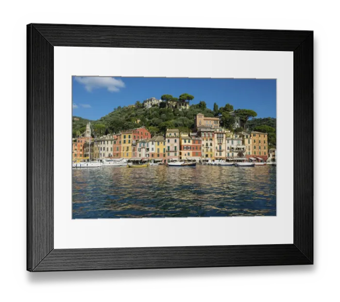 Framed Print : Village with colourful houses on the coast